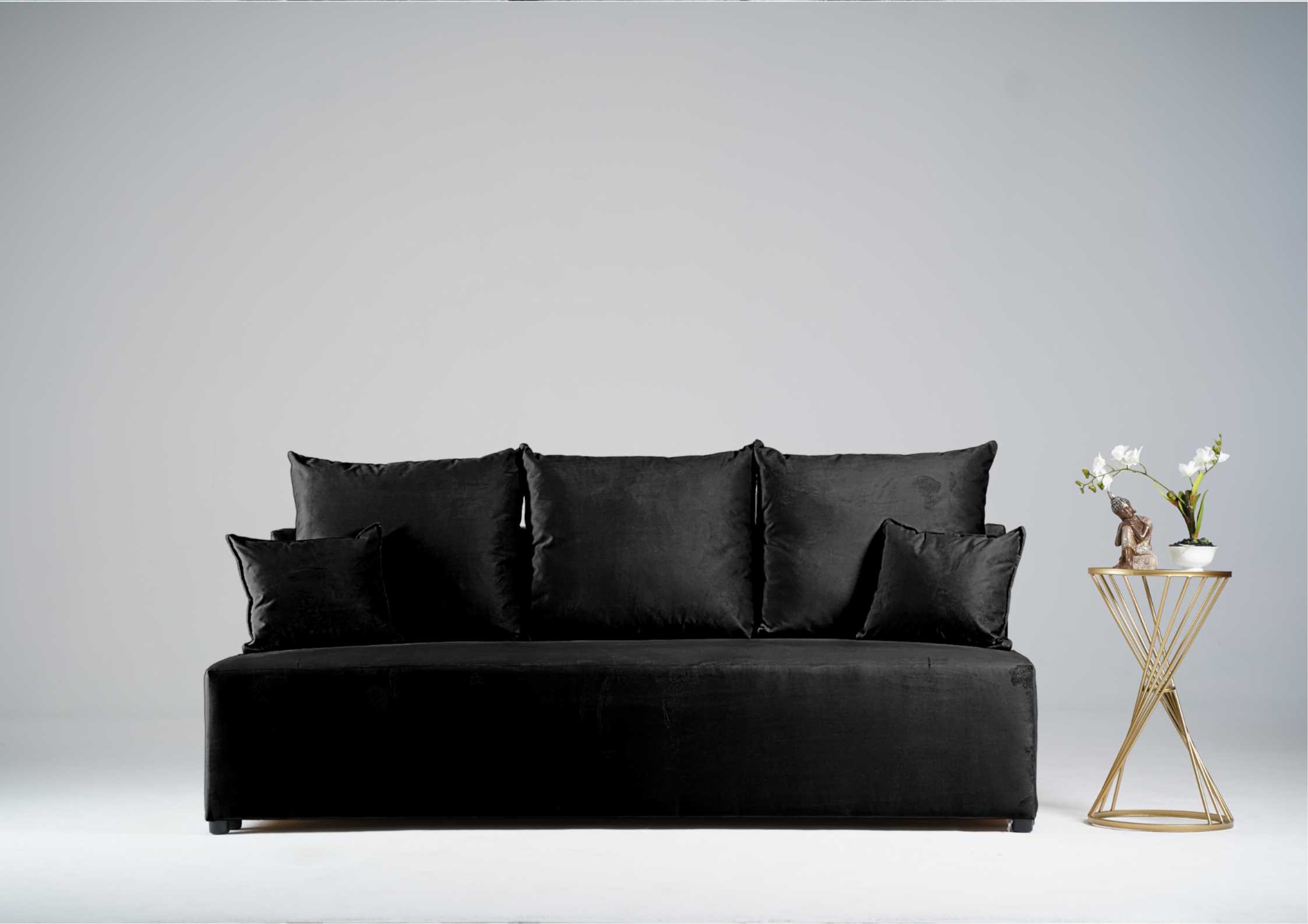 Mała czarna sofa rozkładana